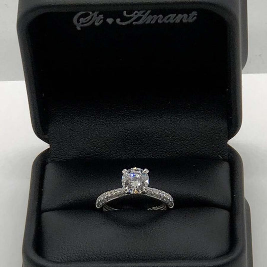 Platinum Ring Containing: 1 approx 1ct round diamond color H, clarity SI1; approx .25ct round diamonds pave set