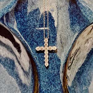 14kt White Gold Cross Containing 1.50ctw Round Diamonds