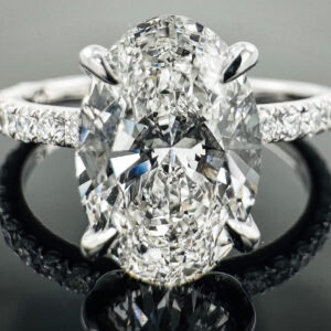 Oval Accented Solitaire With Hidden Halo Set In White Gold